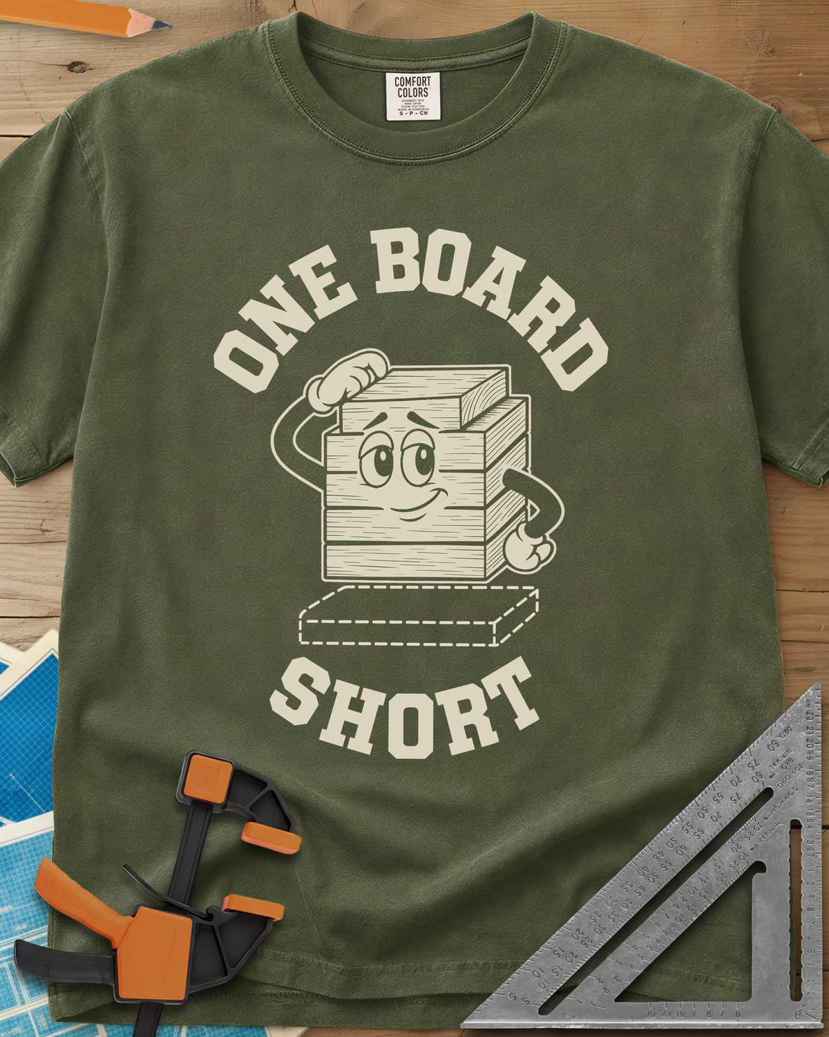 One Board Short heavyweight tee in Hemp, a cartoon stack of boards scratching its head over a missing board
