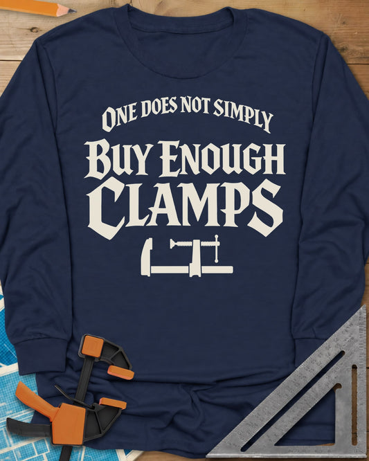 One Does Not Simply Buy Enough Clamps long sleeve shirt in Navy, fantasy-style lettering above a single bar clamp