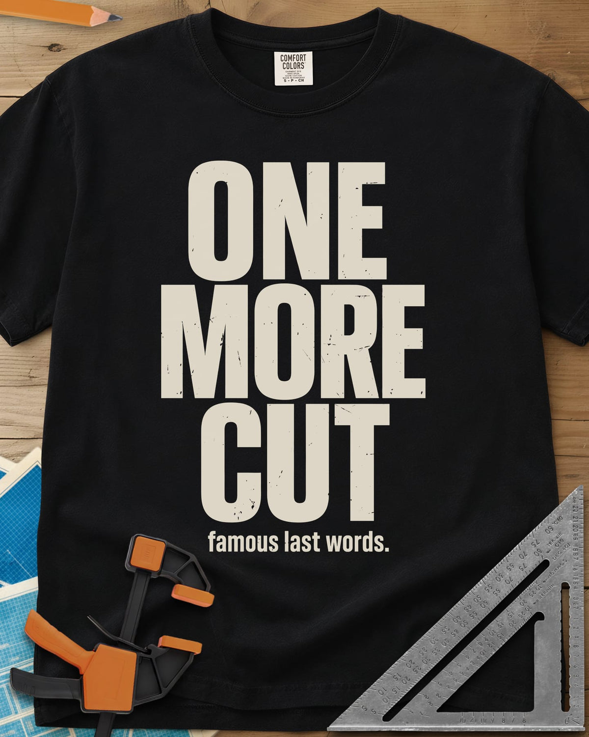 One More Cut heavyweight tee in Black, tall stacked distressed block letters