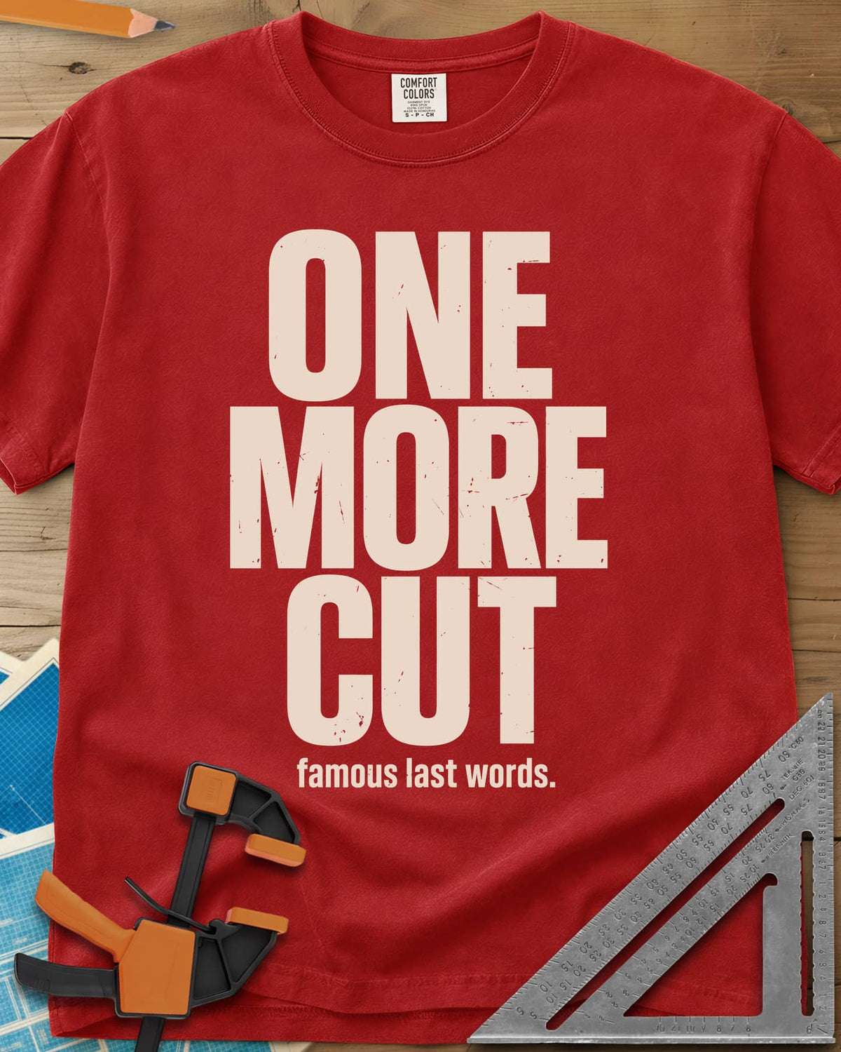 One More Cut heavyweight tee in Red, tall stacked distressed block letters