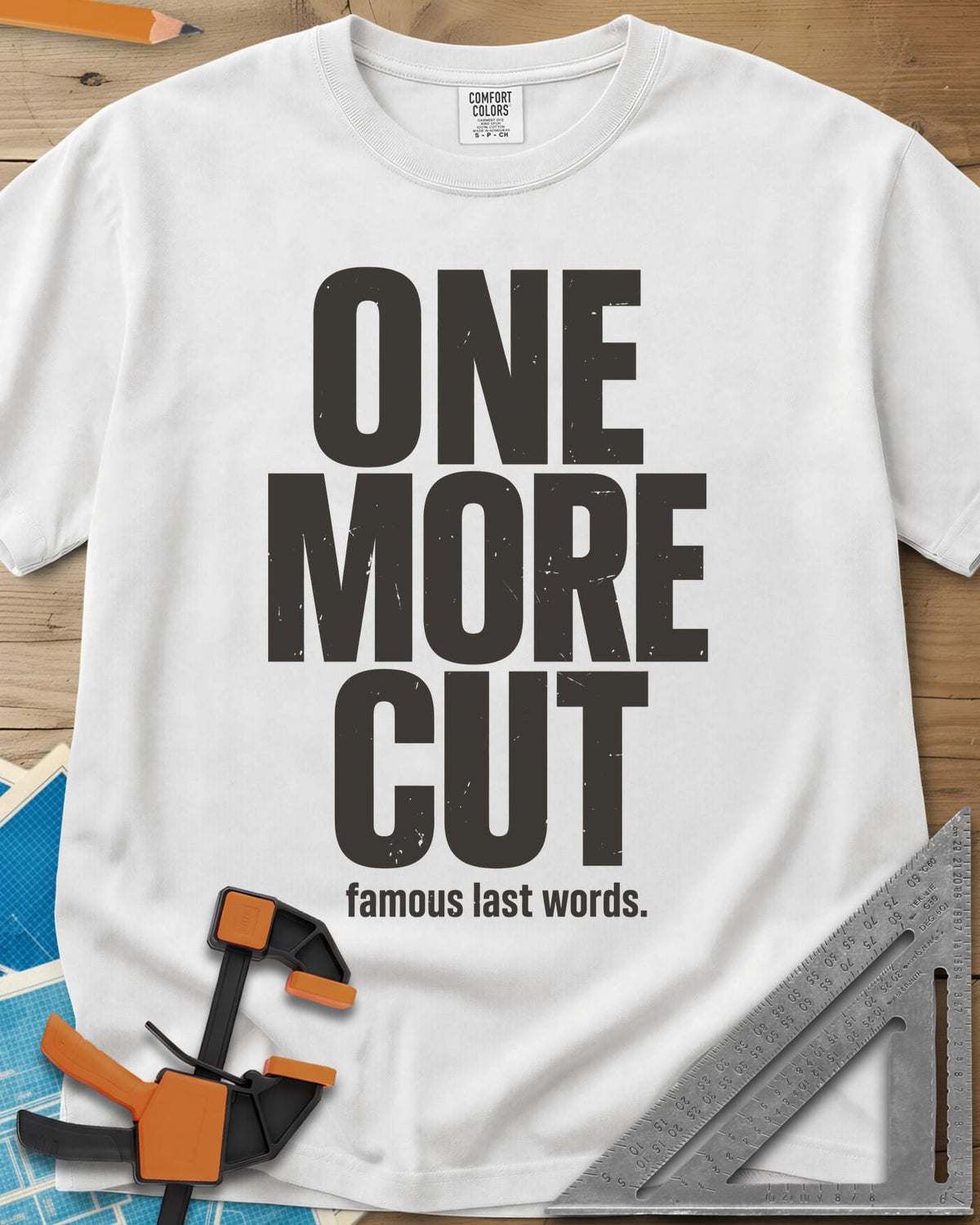 One More Cut heavyweight tee in White, tall stacked distressed block letters