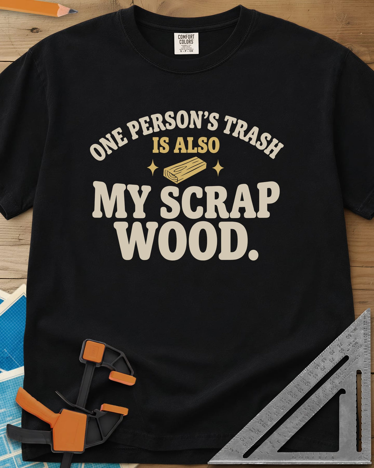 One Person's Trash heavyweight tee in Black, a small wood block between two sparkles under arched text