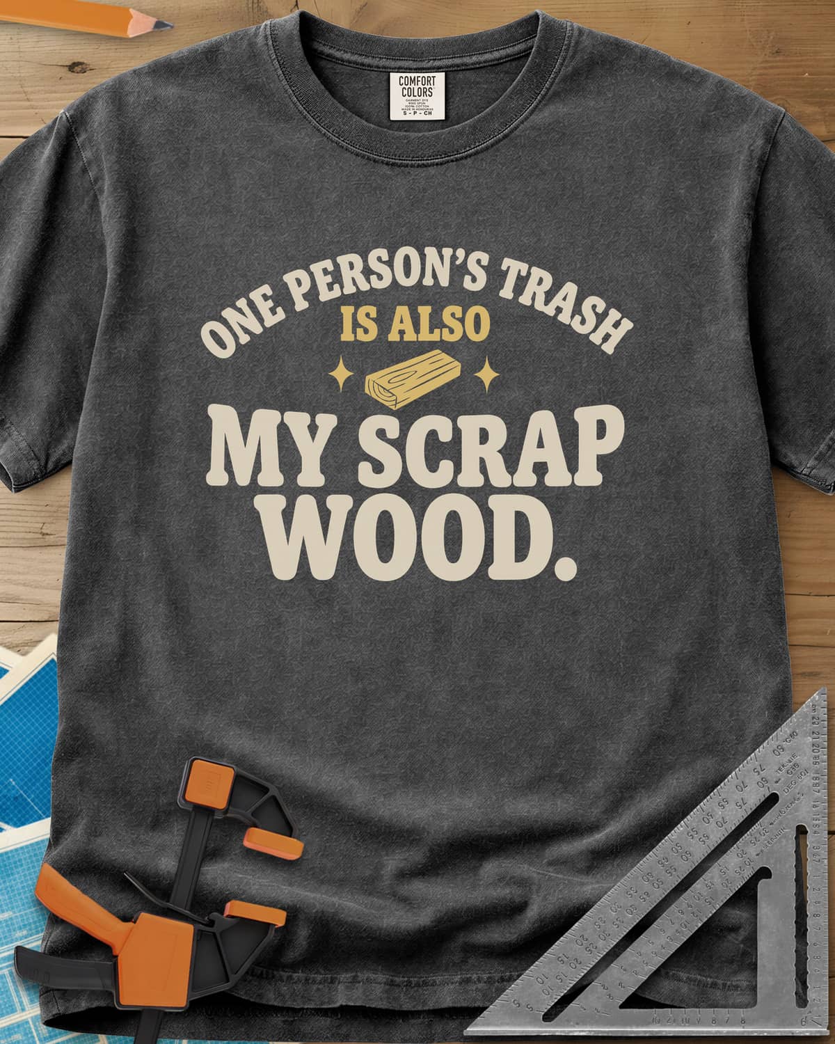 One Person's Trash heavyweight tee in Pepper, a small wood block between two sparkles under arched text
