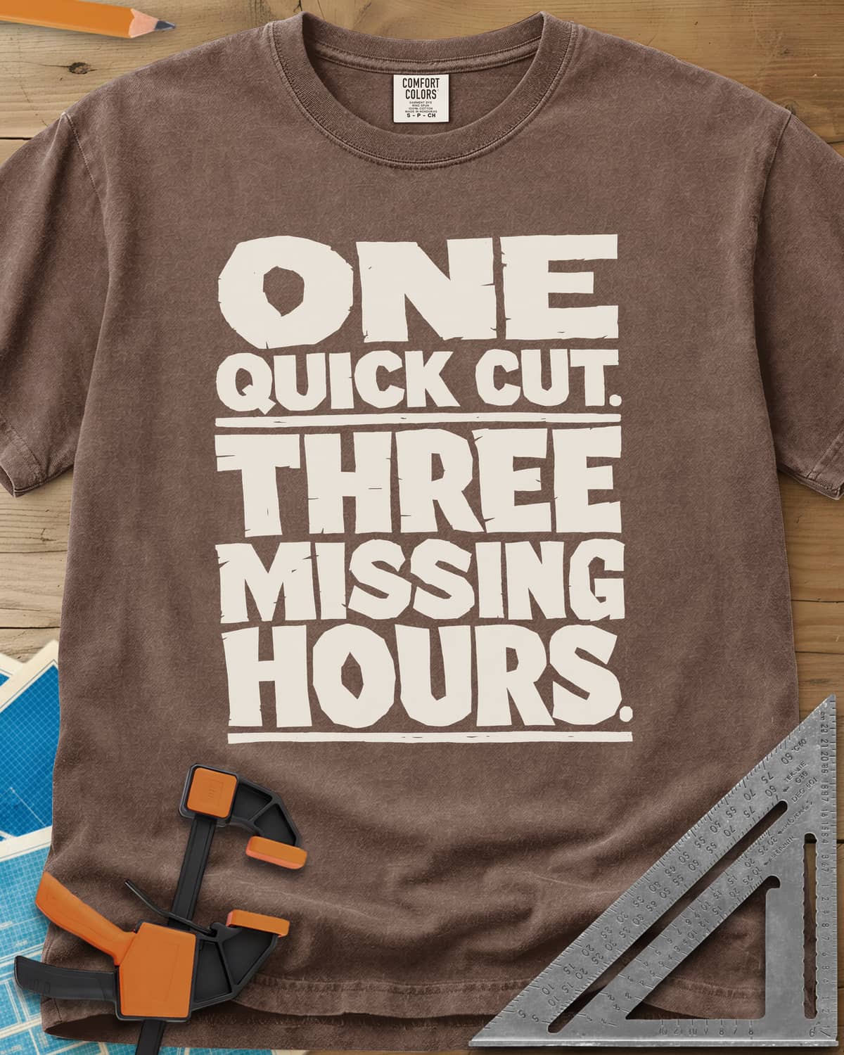 One Quick Cut heavyweight tee in Espresso, stacked chunky rough-edged block lettering, no picture