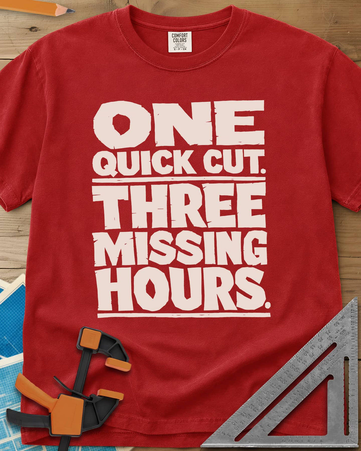 One Quick Cut heavyweight tee in Red, stacked chunky rough-edged block lettering, no picture