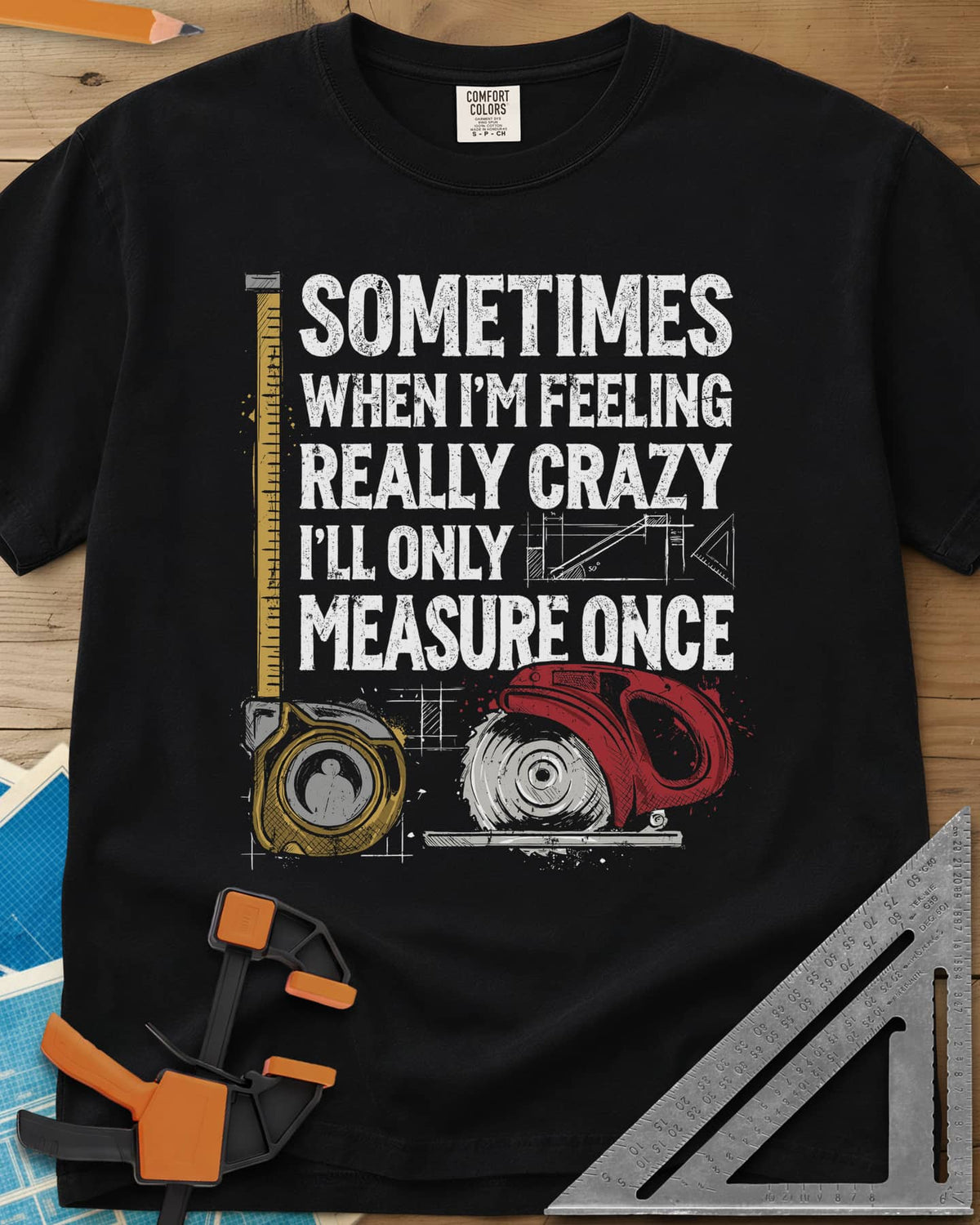 Only Measure Once heavyweight tee in Black, block letters with a yellow tape measure and a red circular saw