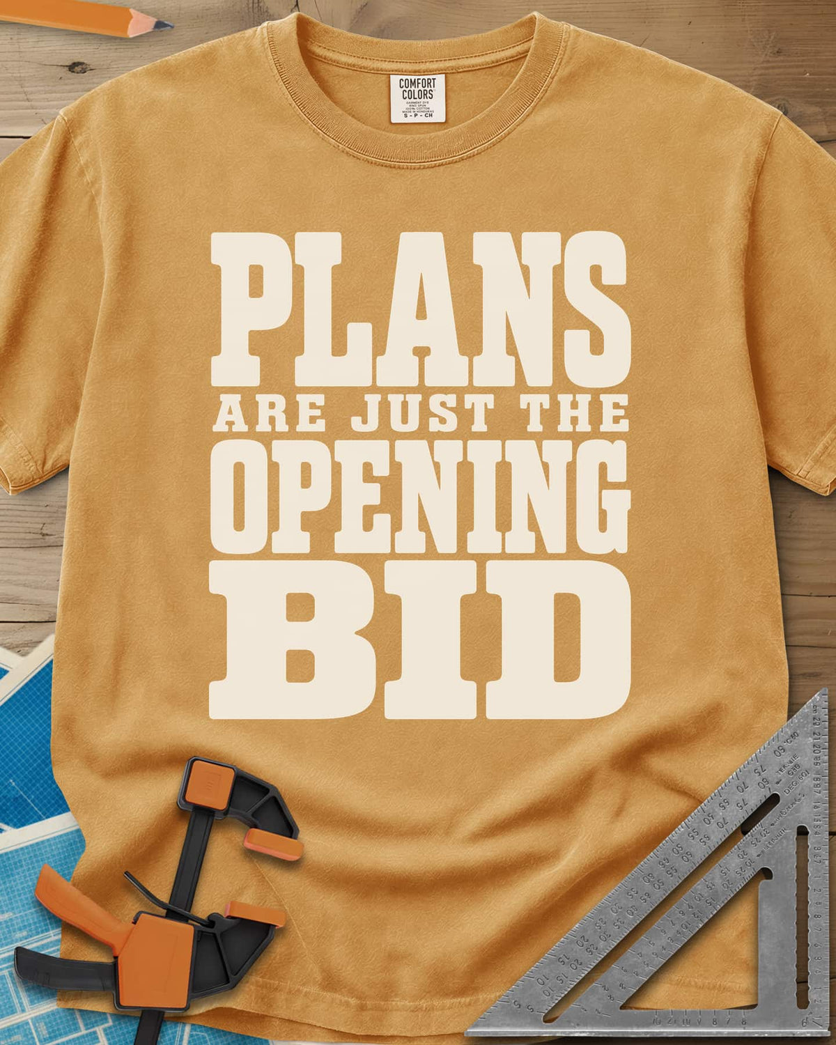 Opening Bid heavyweight tee in Mustard, stacked slab-serif lettering, no picture
