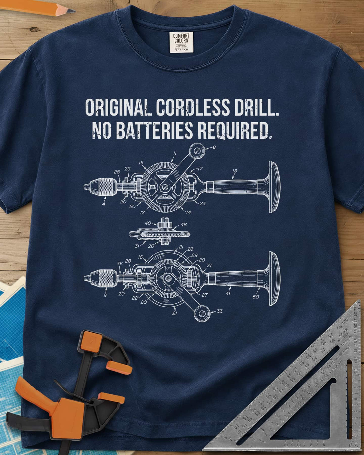 Original Cordless Drill heavyweight tee in Navy, patent-style drawings of a hand-crank drill with numbered parts