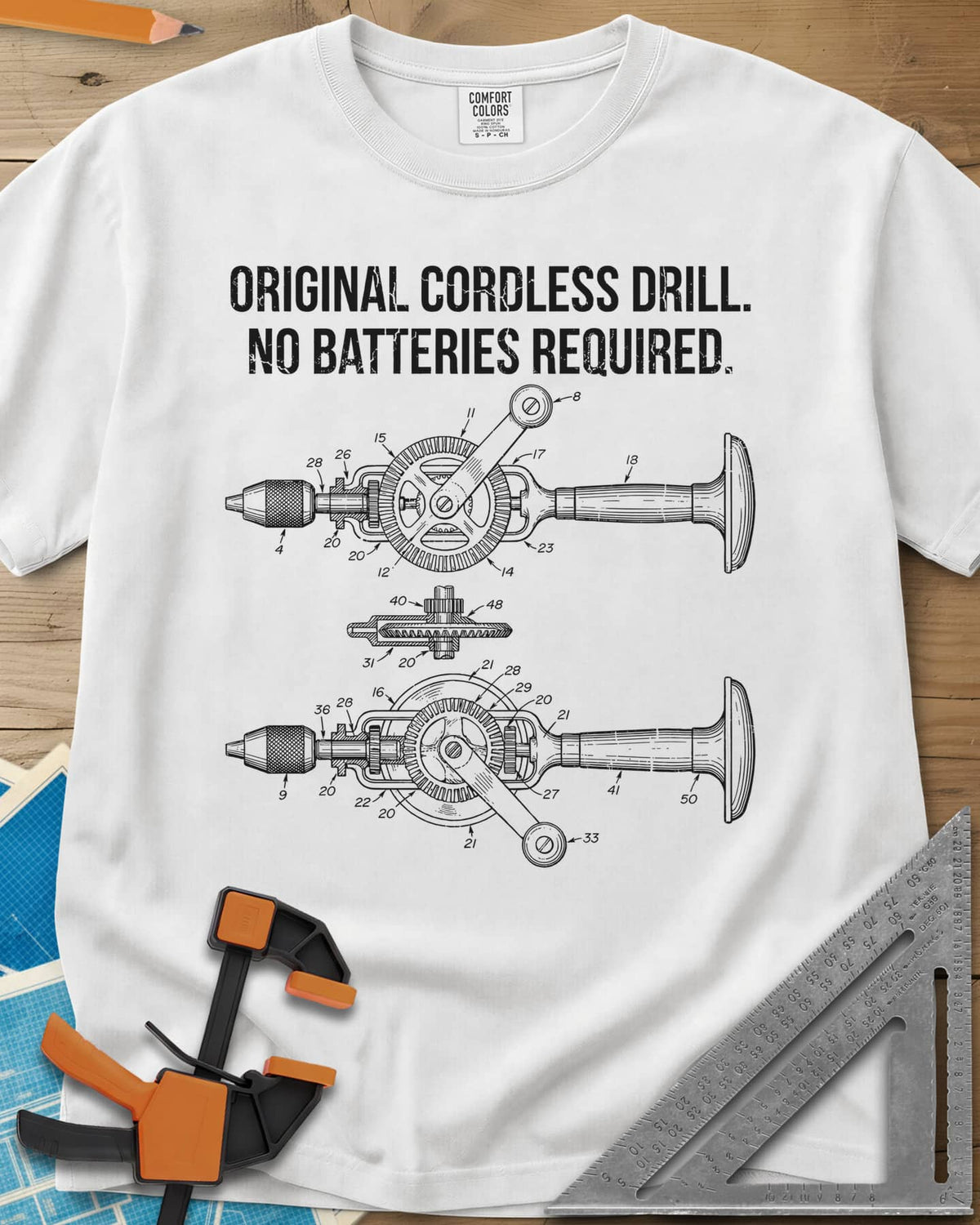 Original Cordless Drill heavyweight tee in White, patent-style drawings of a hand-crank drill with numbered parts