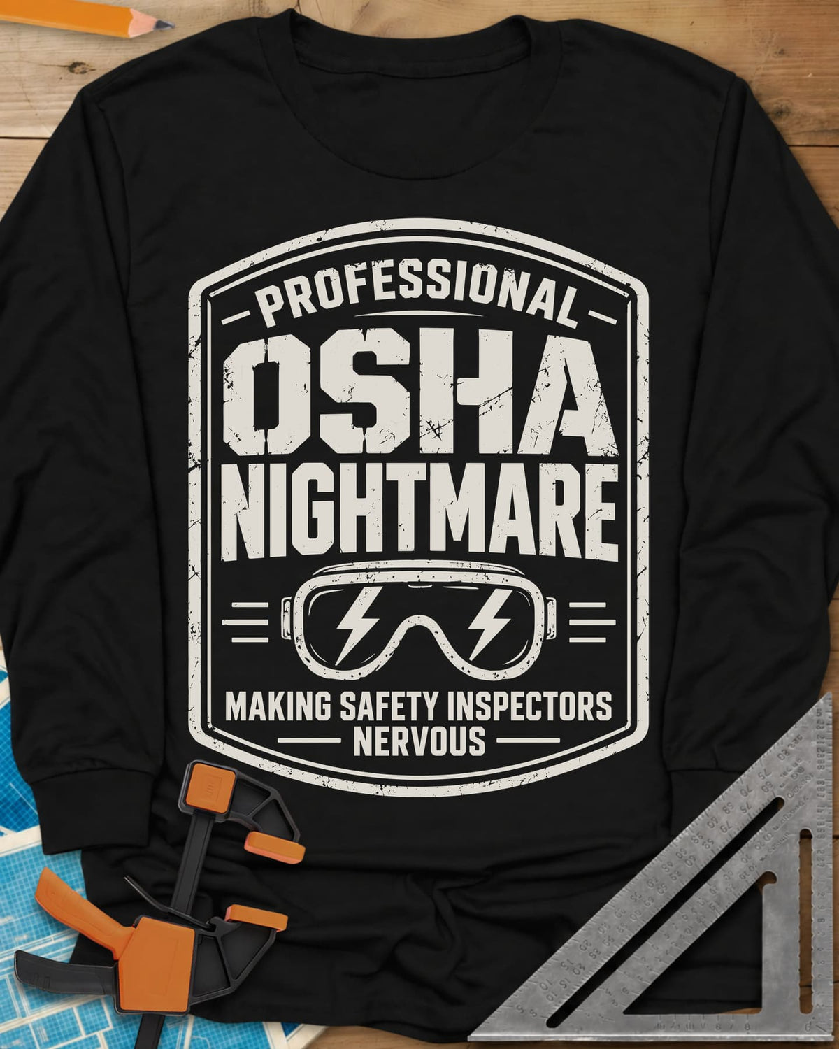 OSHA Nightmare long sleeve shirt in Black, a rugged badge with safety goggles and lightning bolts
