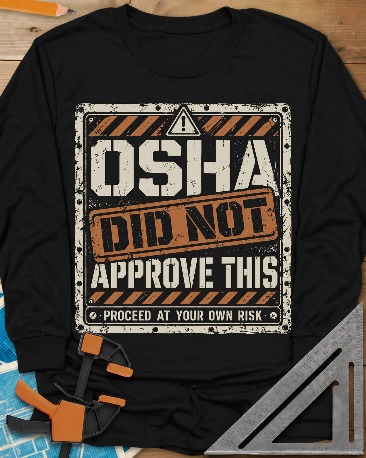 OSHA Not Approved long sleeve shirt in Black, a worn warning sign with hazard stripes and a DID NOT stamp