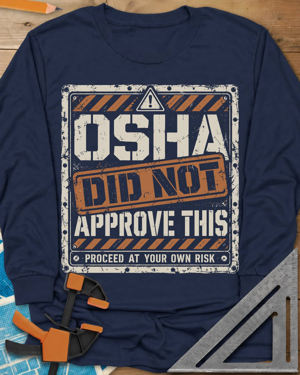OSHA Not Approved long sleeve shirt in Navy, a worn warning sign with hazard stripes and a DID NOT stamp