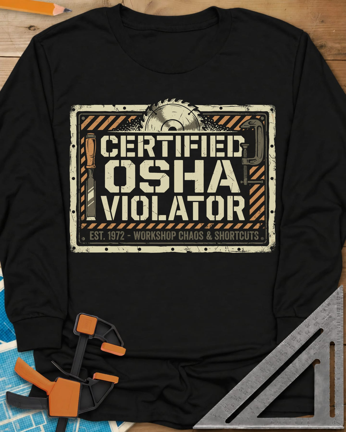 Osha Violator long sleeve shirt in Black, a hazard-striped warning sign with a saw blade, chisel and clamp