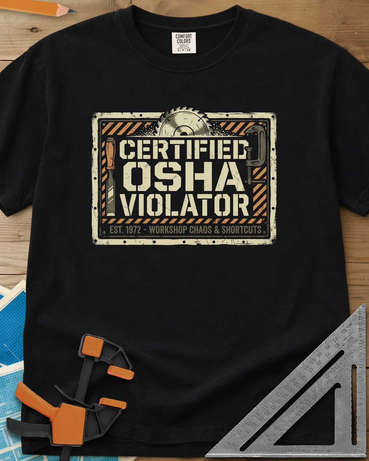 Osha Violator heavyweight tee in Black, a hazard-striped warning sign with a saw blade, chisel and clamp