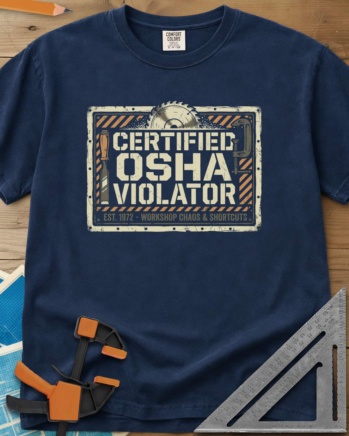 Osha Violator heavyweight tee in Navy, a hazard-striped warning sign with a saw blade, chisel and clamp