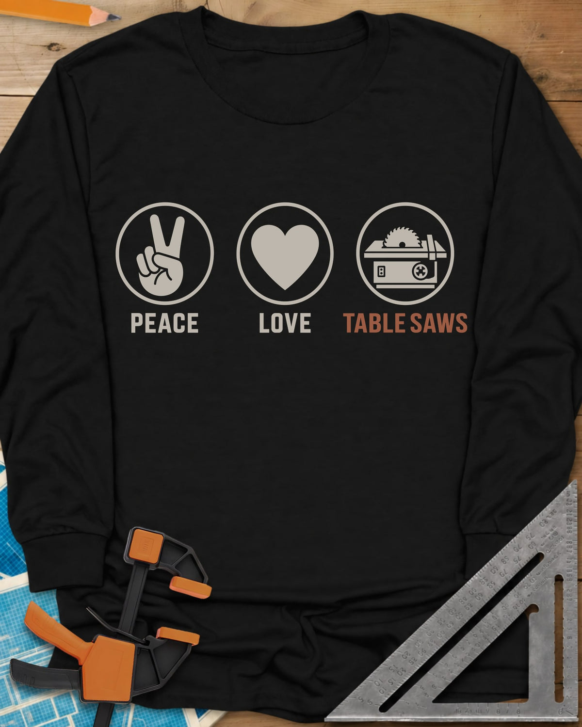 Peace Love Table Saws long sleeve shirt in Black, three circled icons: a peace sign, a heart and a table saw