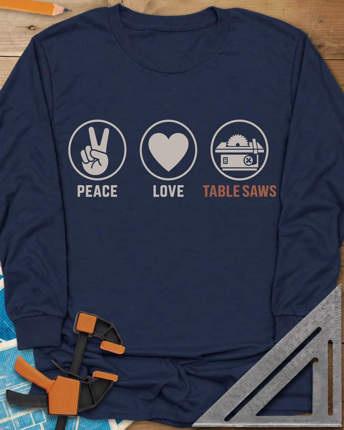 Peace Love Table Saws long sleeve shirt in Navy, three circled icons: a peace sign, a heart and a table saw