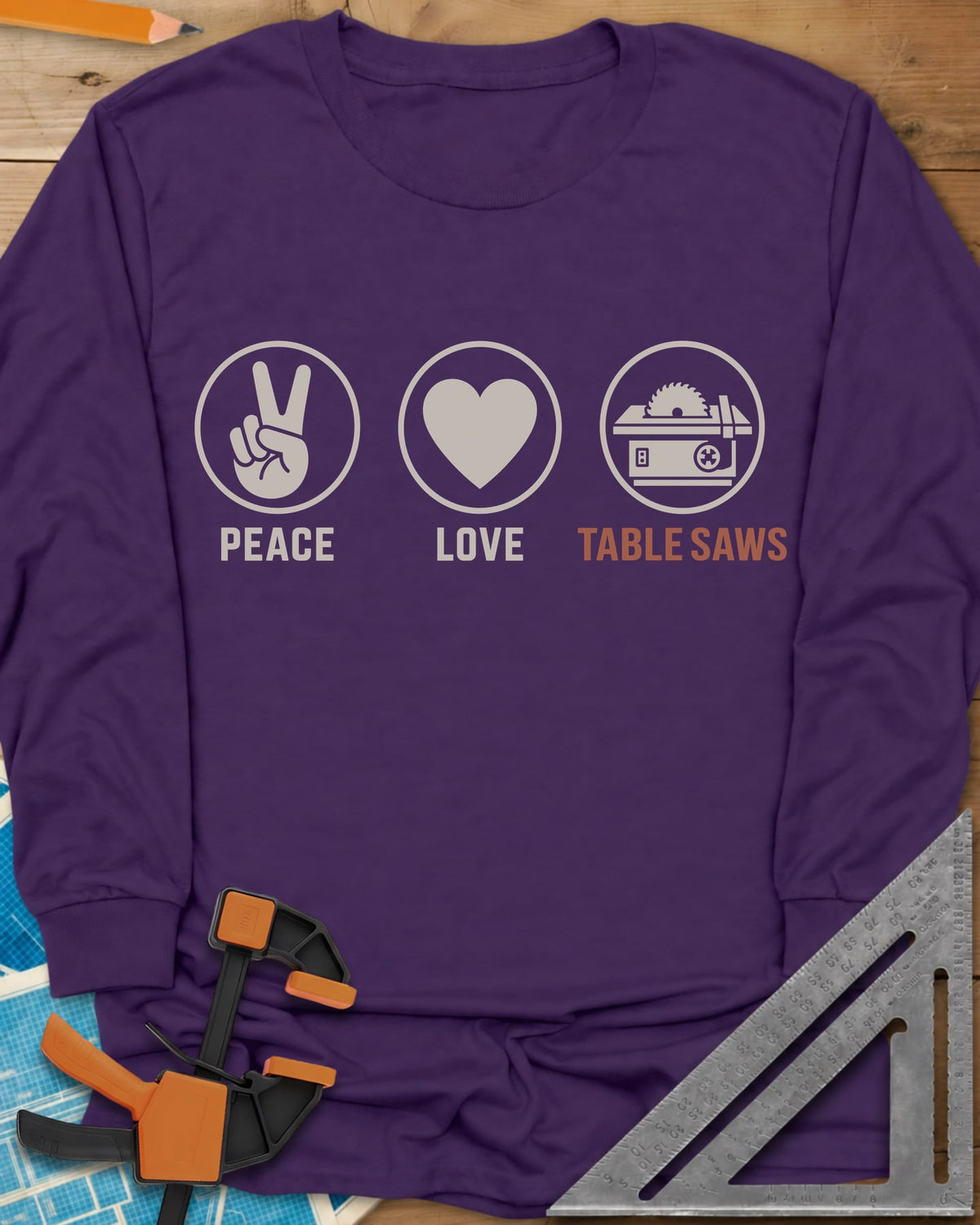 Peace Love Table Saws long sleeve shirt in Purple, three circled icons: a peace sign, a heart and a table saw