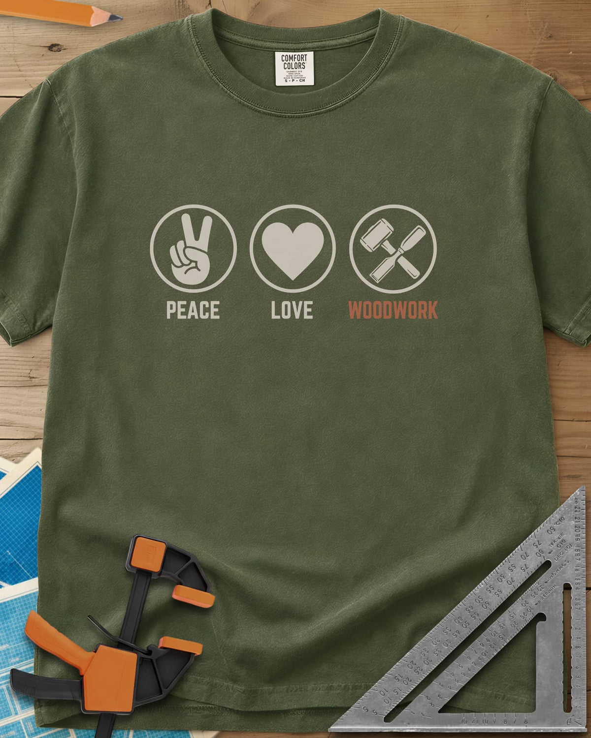 Peace Love Woodwork heavyweight tee in Hemp, three circled icons: a peace sign, a heart, a mallet and chisel