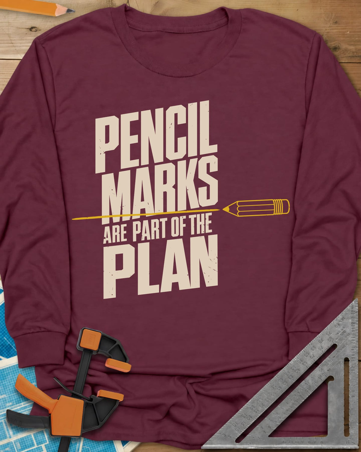 Pencil Marks long sleeve shirt in Maroon, a pencil drawing a line through stacked block lettering