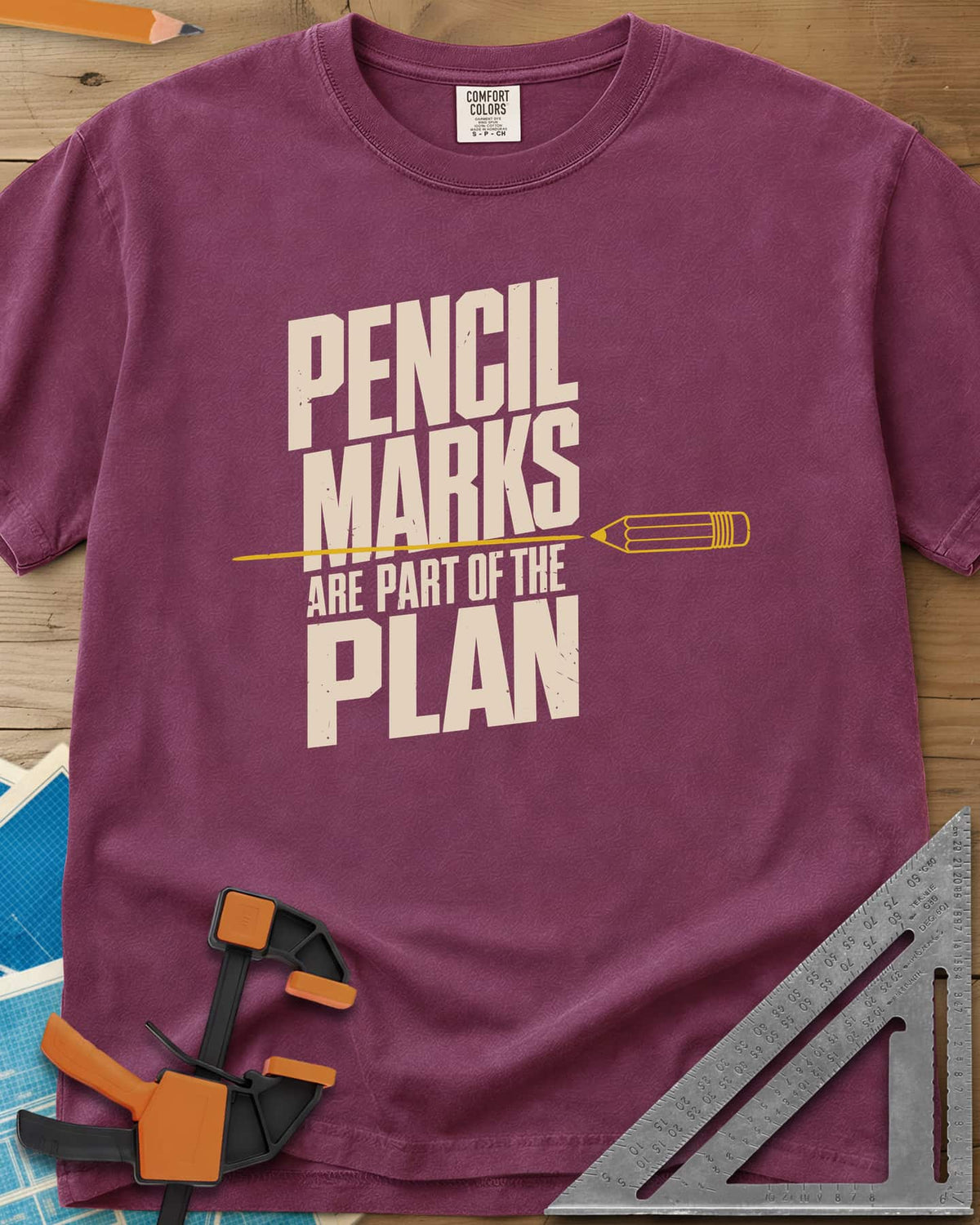 Pencil Marks heavyweight tee in Berry, a pencil drawing a line through stacked block lettering