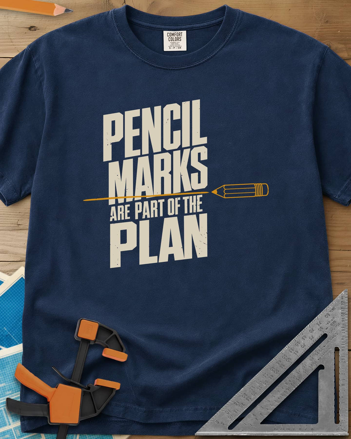 Pencil Marks heavyweight tee in Navy, a pencil drawing a line through stacked block lettering