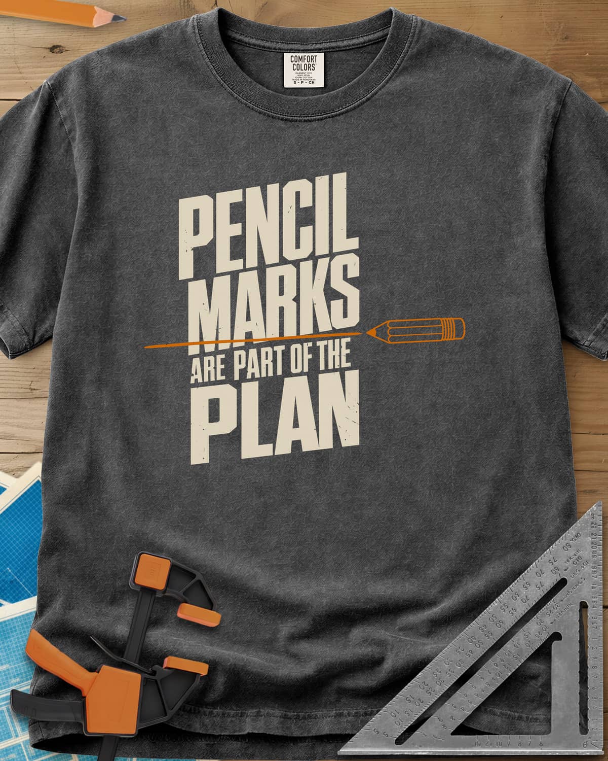 Pencil Marks heavyweight tee in Pepper, a pencil drawing a line through stacked block lettering