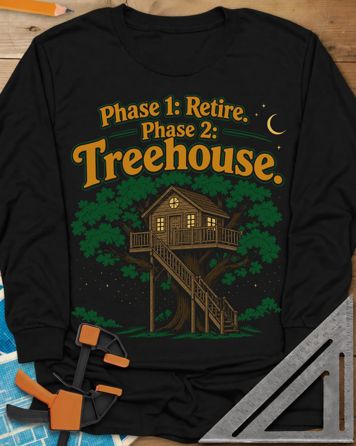 Phase 1 Retire Phase 2 Treehouse long sleeve shirt in Black, a lit treehouse with a deck and long staircase under a night sky