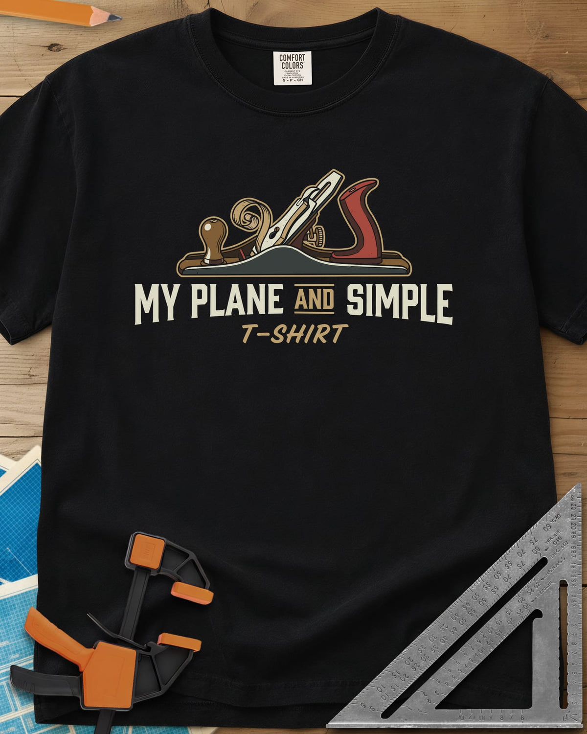 Plane and Simple heavyweight tee in Black, a hand plane with a wood curl above a pun caption