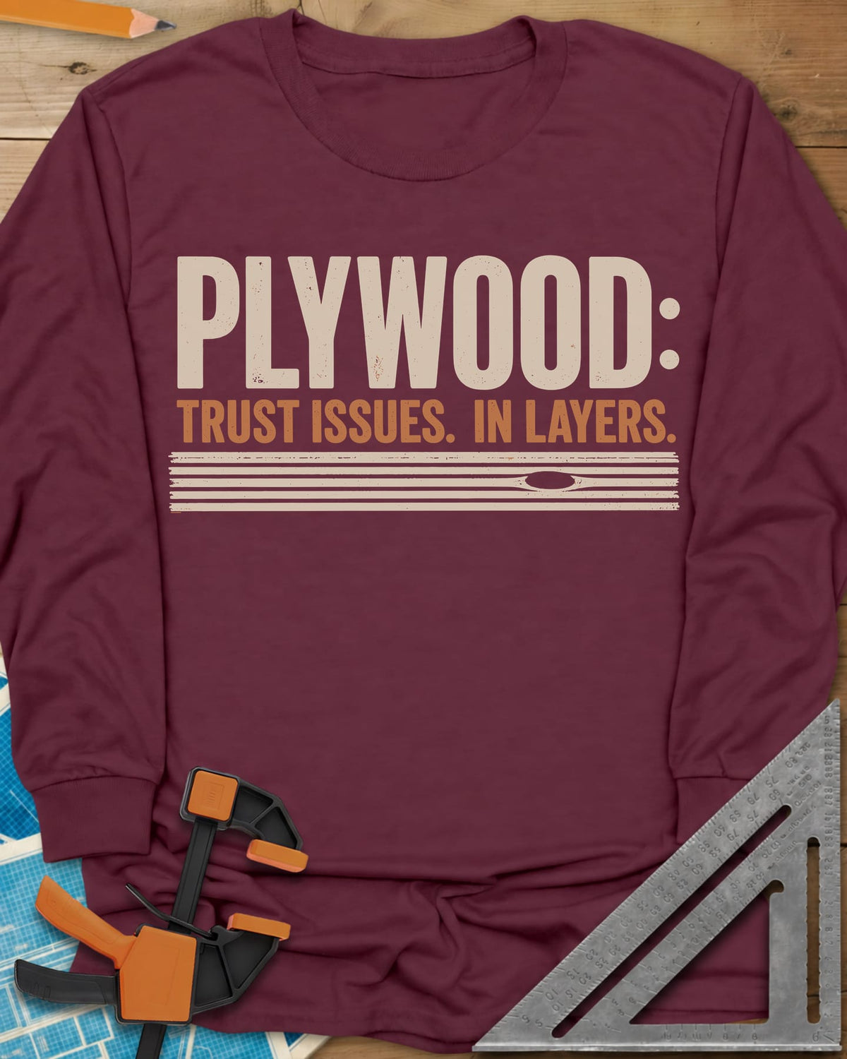 Plywood Trust long sleeve shirt in Maroon, striped plywood layers with an oval knot patch