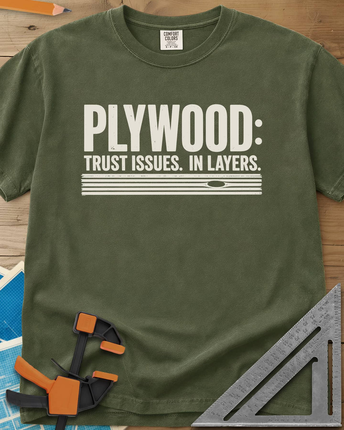 Plywood Trust heavyweight tee in Hemp, striped plywood layers with an oval knot patch