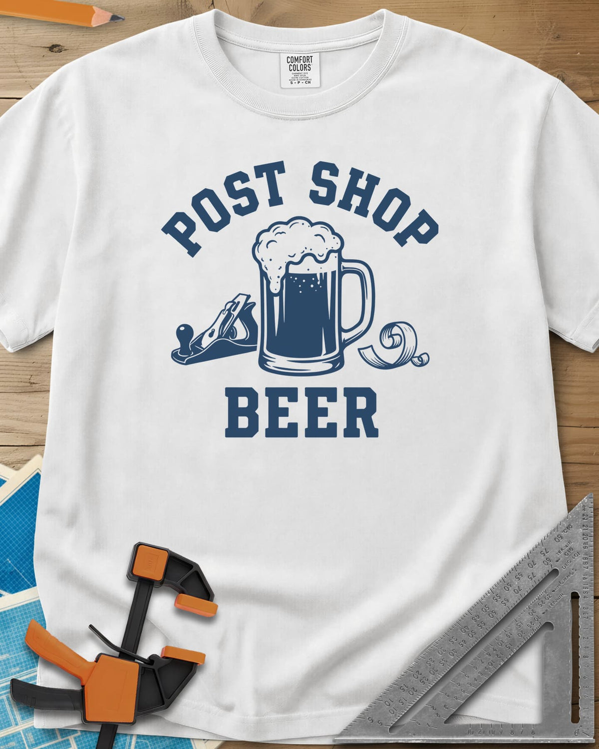Post Shop Beer Woodworking heavyweight tee in White, a frothy beer mug flanked by a hand plane and a wood shaving