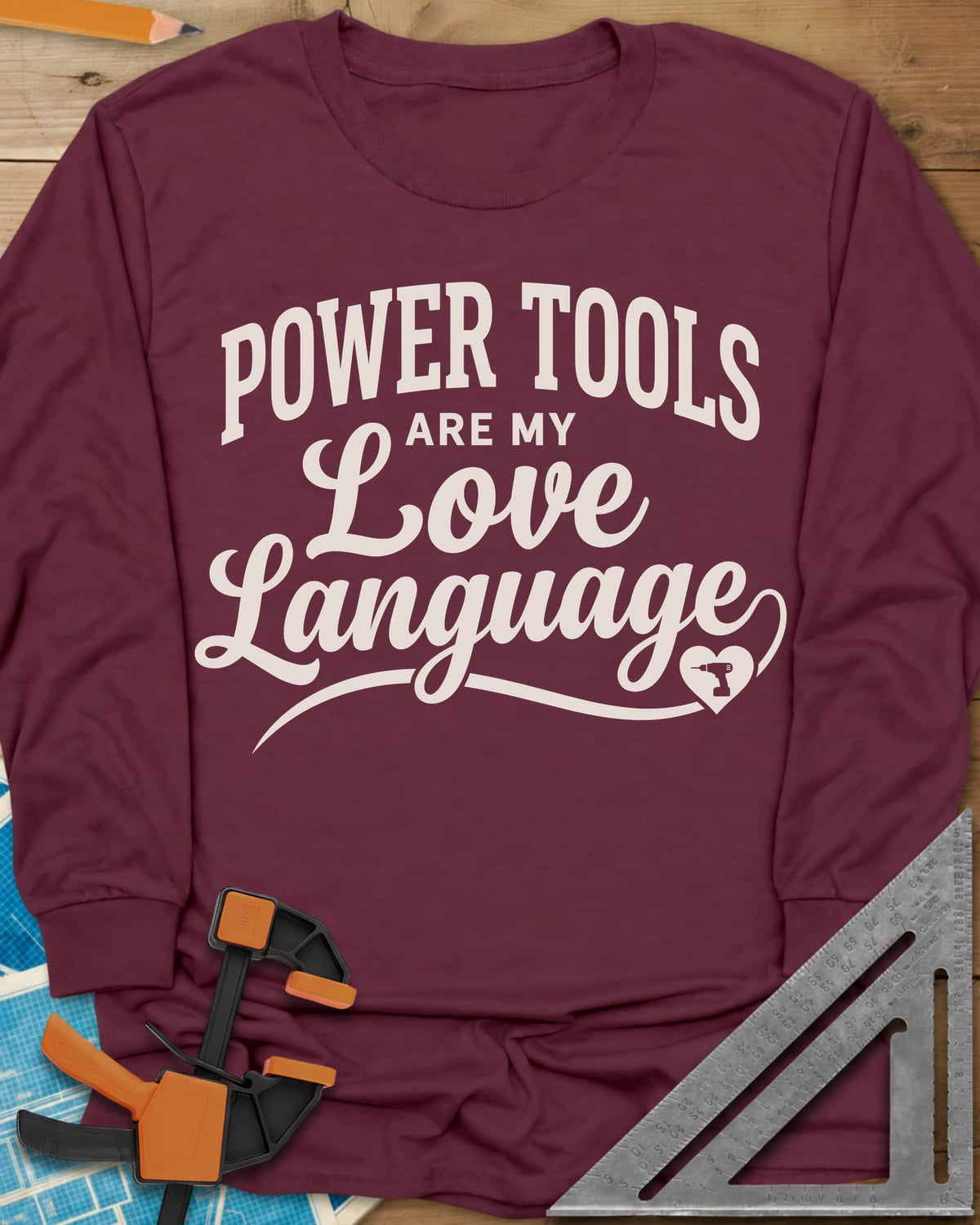 Power Tools Are My Love Language long sleeve shirt in Maroon, script lettering with a swash ending in a heart holding a drill