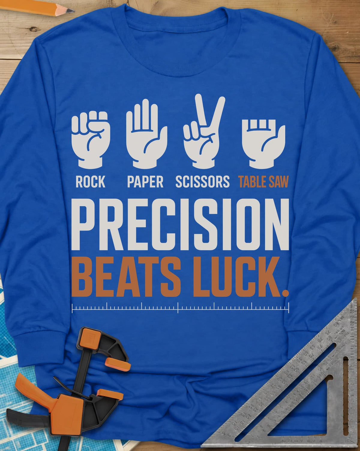 Precision Beats Luck long sleeve shirt in Royal, three hand signs and a short-fingered table saw hand over a ruler