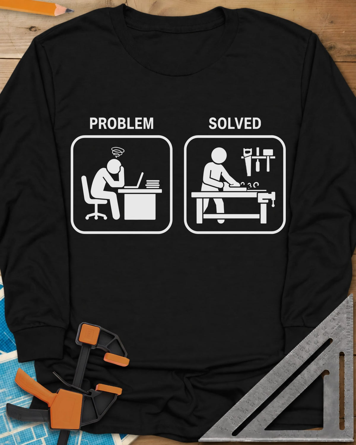 Problem Solved long sleeve shirt in Black, two pictogram panels, a stressed desk worker and a woodworker planing