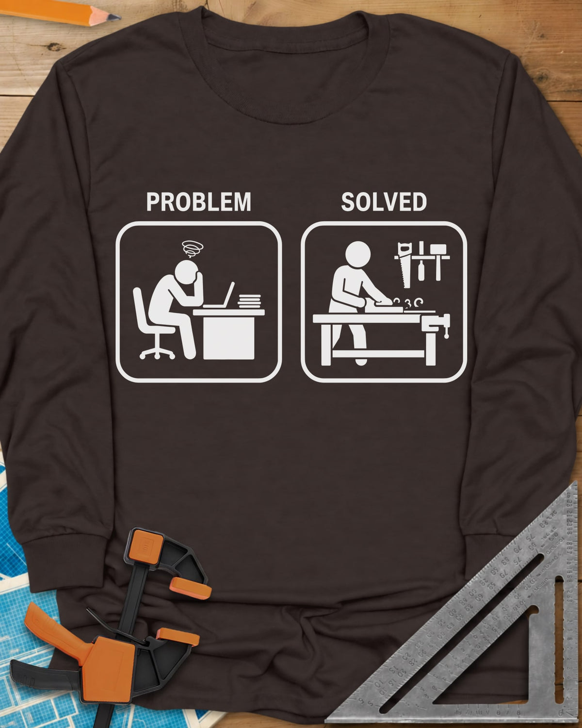 Problem Solved long sleeve shirt in Dark Chocolate, two pictogram panels, a stressed desk worker and a woodworker planing