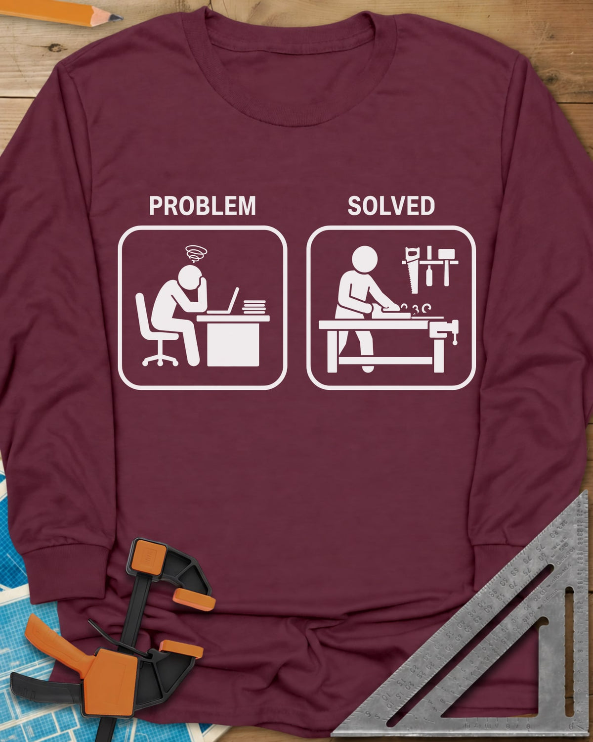 Problem Solved long sleeve shirt in Maroon, two pictogram panels, a stressed desk worker and a woodworker planing