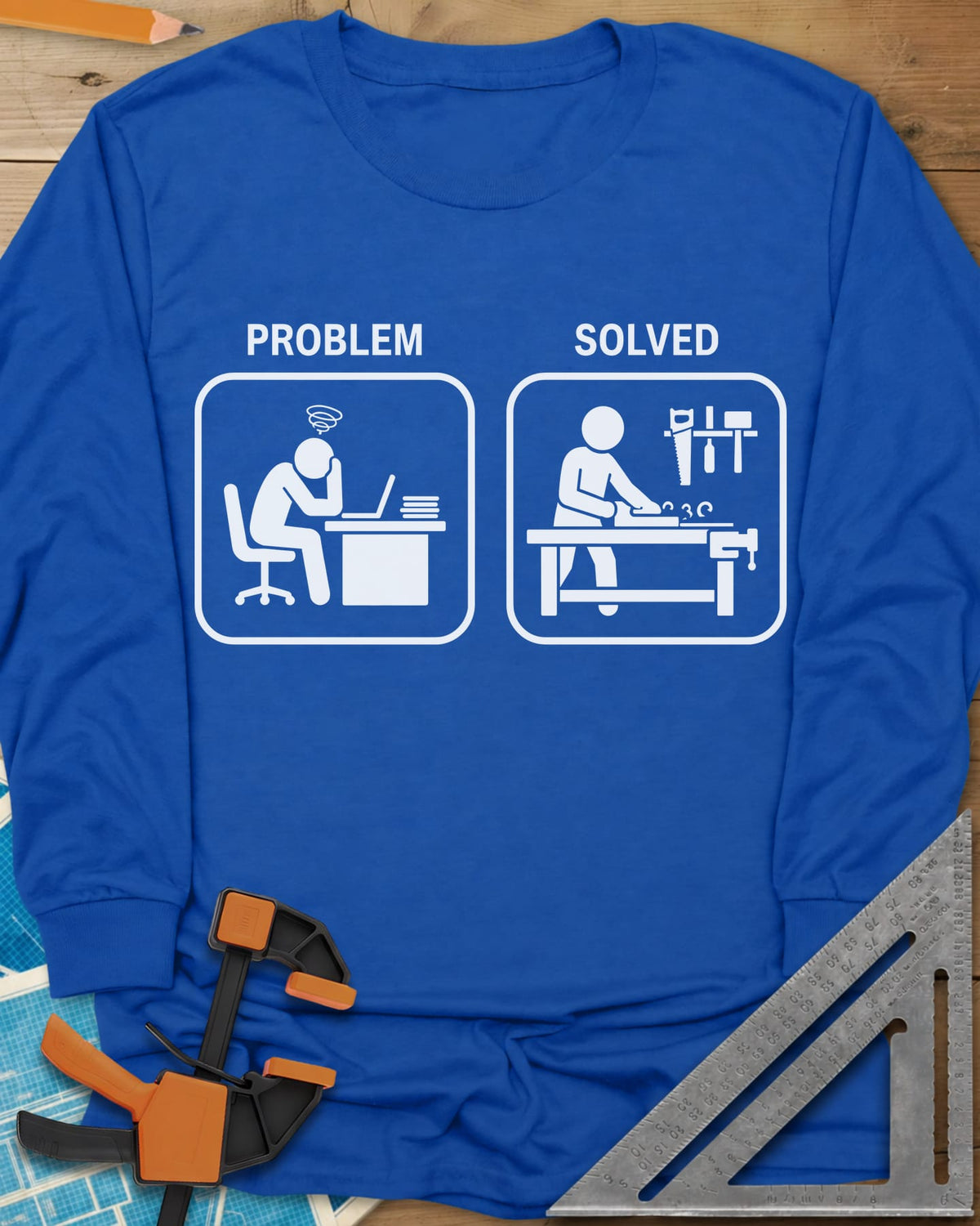 Problem Solved long sleeve shirt in Royal, two pictogram panels, a stressed desk worker and a woodworker planing