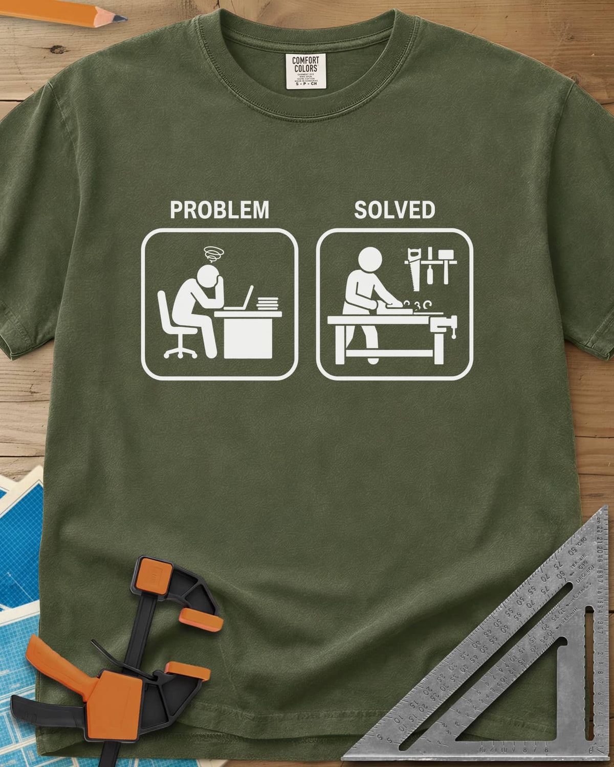 Problem Solved heavyweight tee in Hemp, two pictogram panels, a stressed desk worker and a woodworker planing