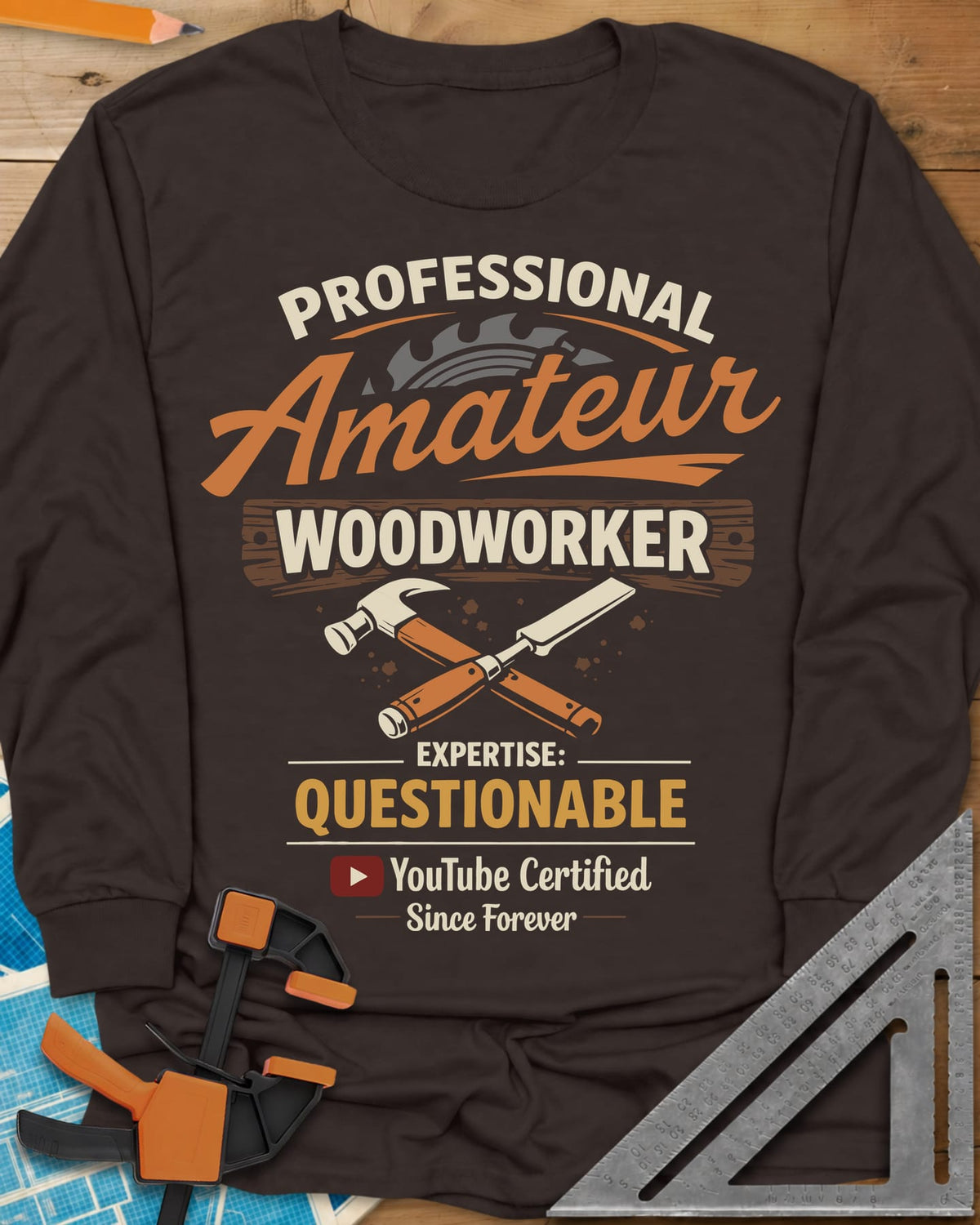 Professional Amateur long sleeve shirt in Dark Chocolate, a saw blade, crossed hammer and chisel, and a YouTube play button