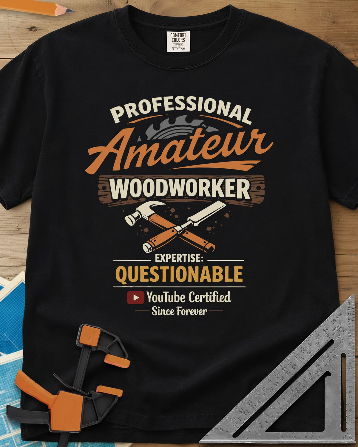 Professional Amateur heavyweight tee in Black, a saw blade, crossed hammer and chisel, and a YouTube play button