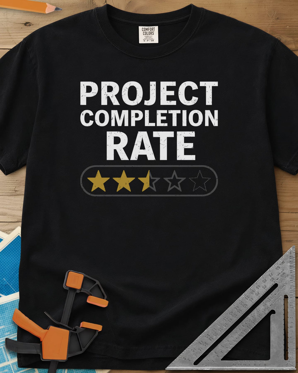 Project Completion Rate heavyweight tee in Black, a five-star rating bar with two and a half stars filled in