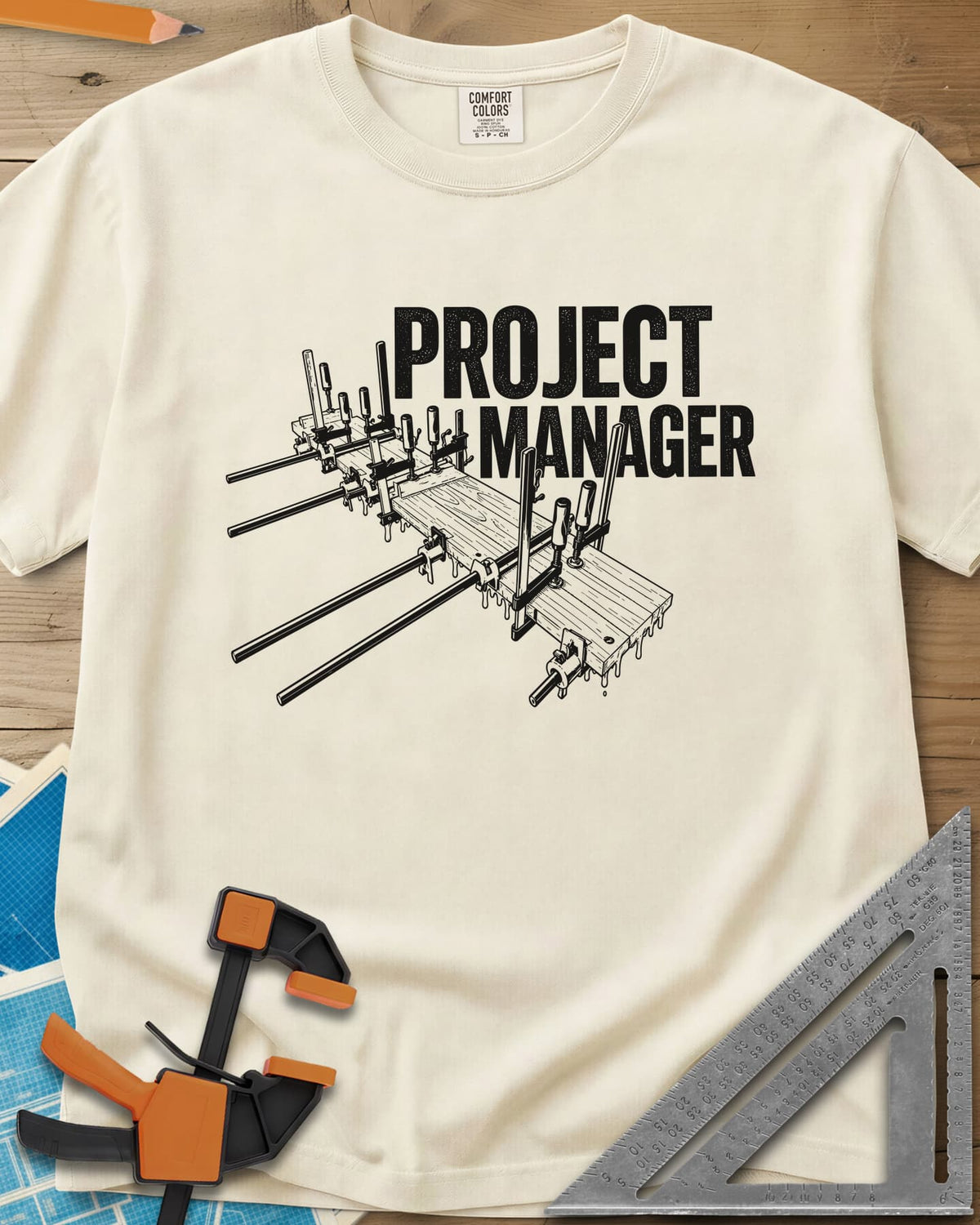 Project Manager heavyweight tee in Ivory, a glued-up board panel held by bar clamps with glue drips