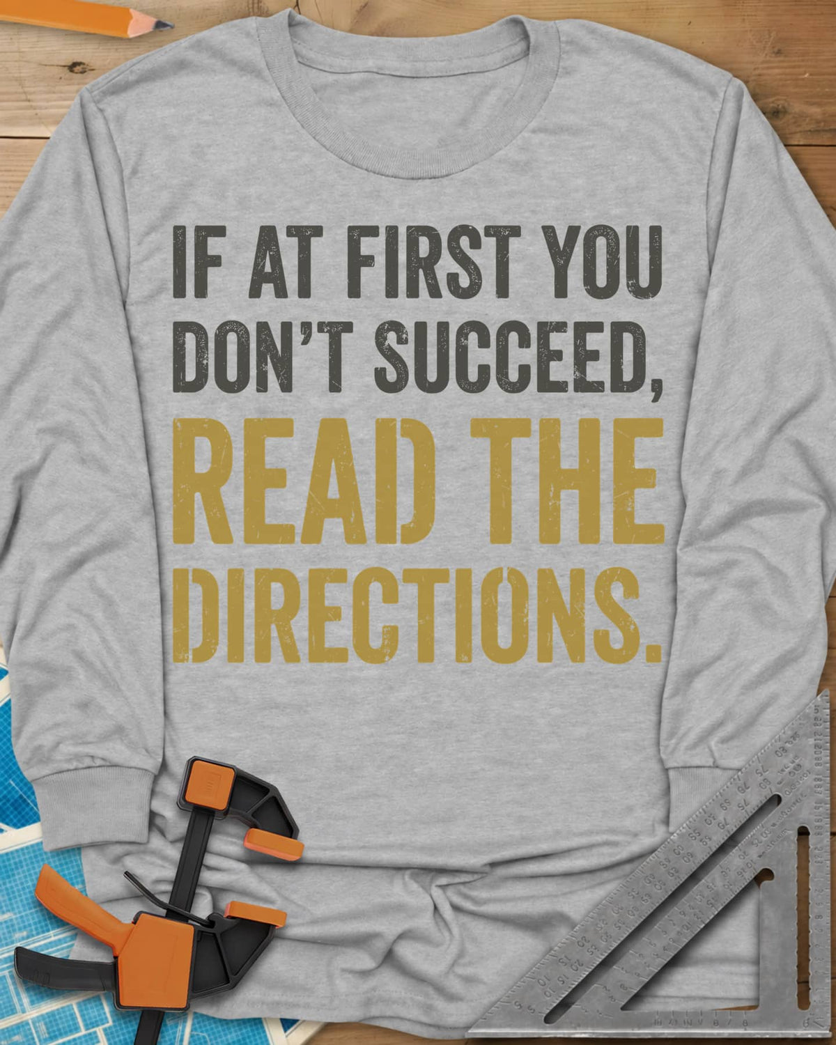Read The Directions long sleeve shirt in Sport Grey, distressed block lettering with READ THE DIRECTIONS in gold