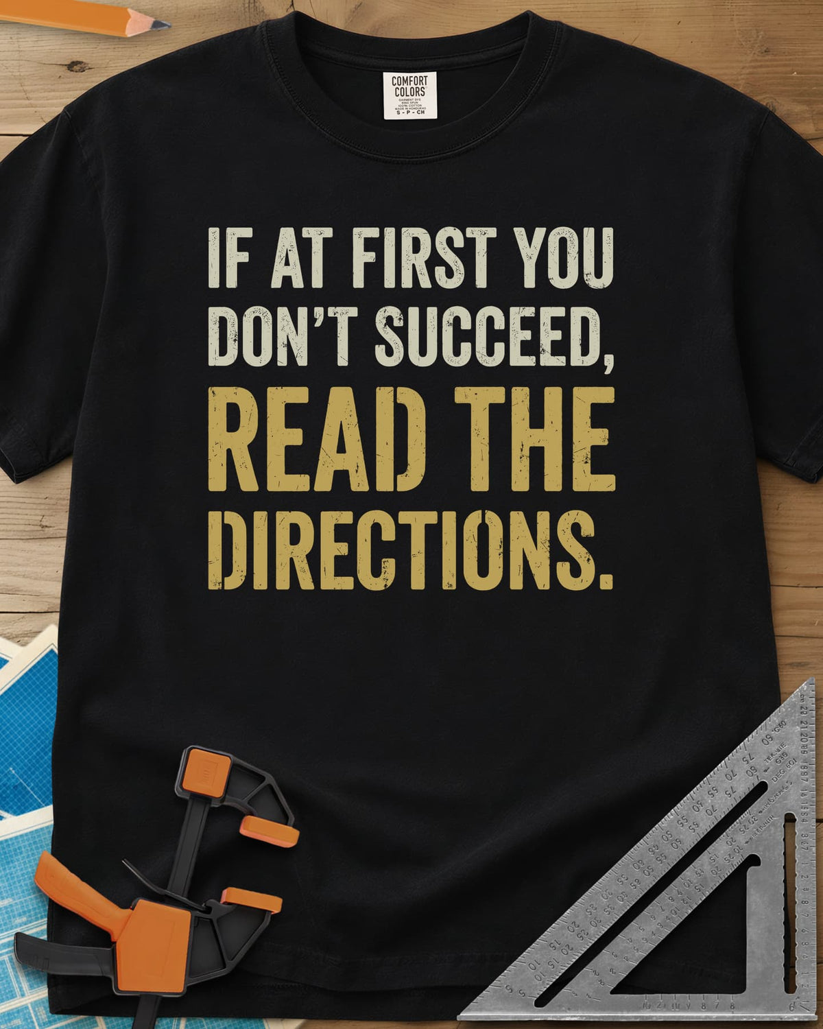 Read The Directions heavyweight tee in Black, distressed block lettering with READ THE DIRECTIONS in gold