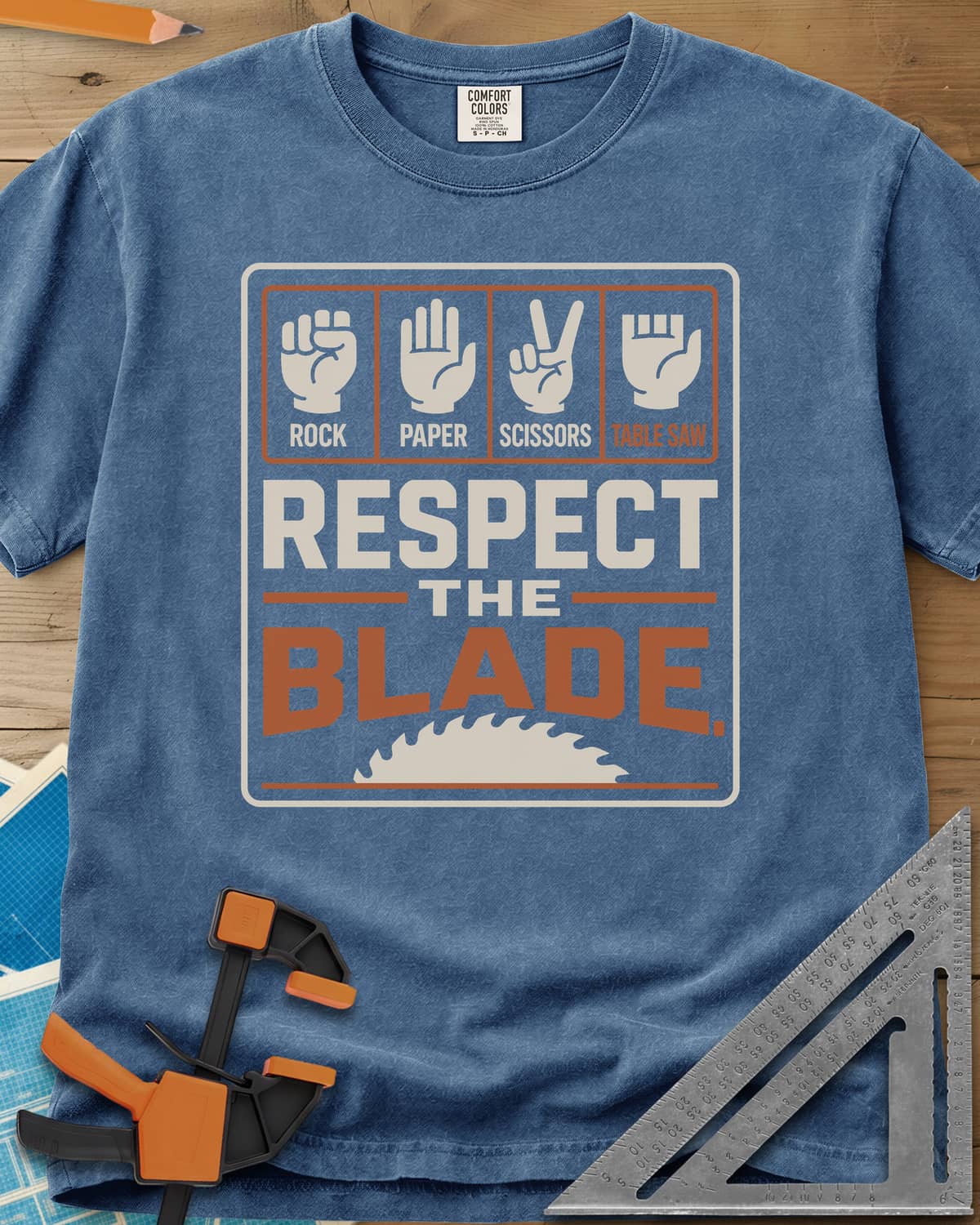 Respect The Blade heavyweight tee in Blue Jean, four hand signs, the last with stubby fingers, over a saw blade