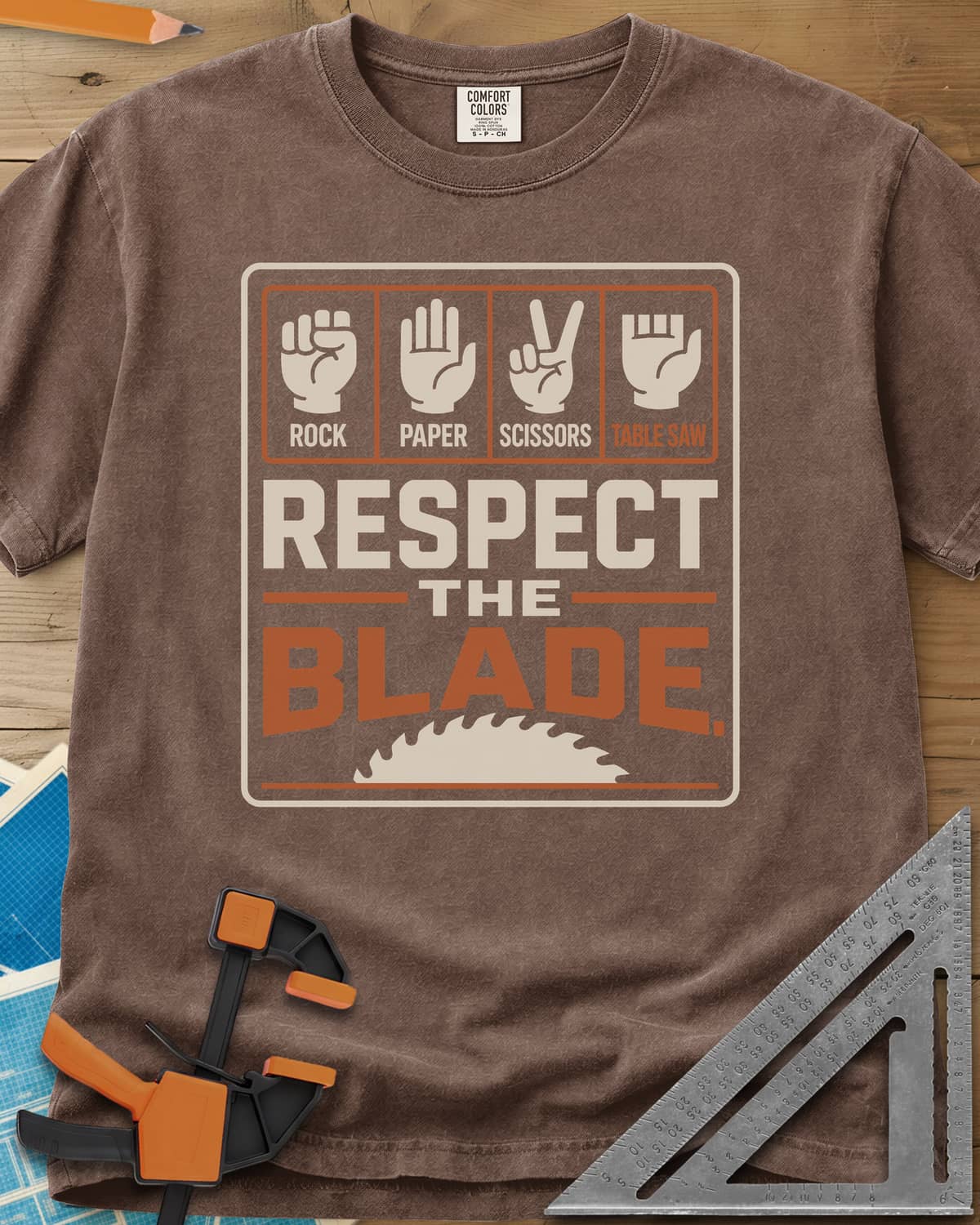 Respect The Blade heavyweight tee in Espresso, four hand signs, the last with stubby fingers, over a saw blade