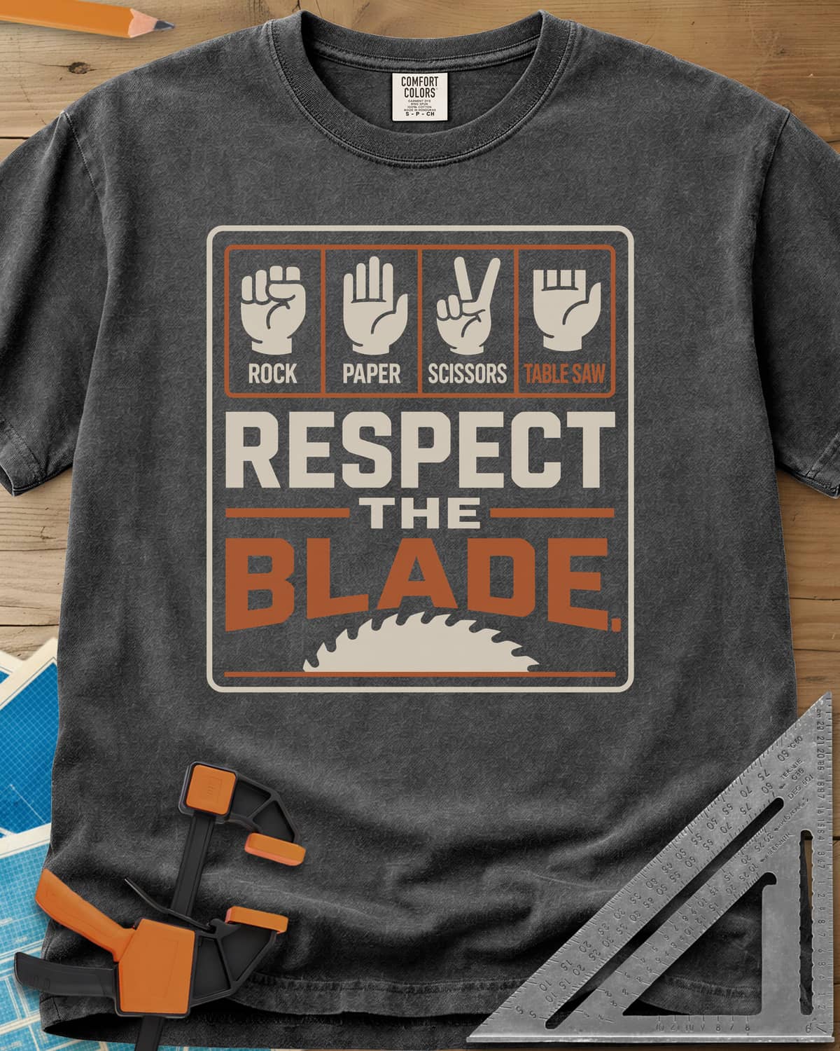 Respect The Blade heavyweight tee in Pepper, four hand signs, the last with stubby fingers, over a saw blade