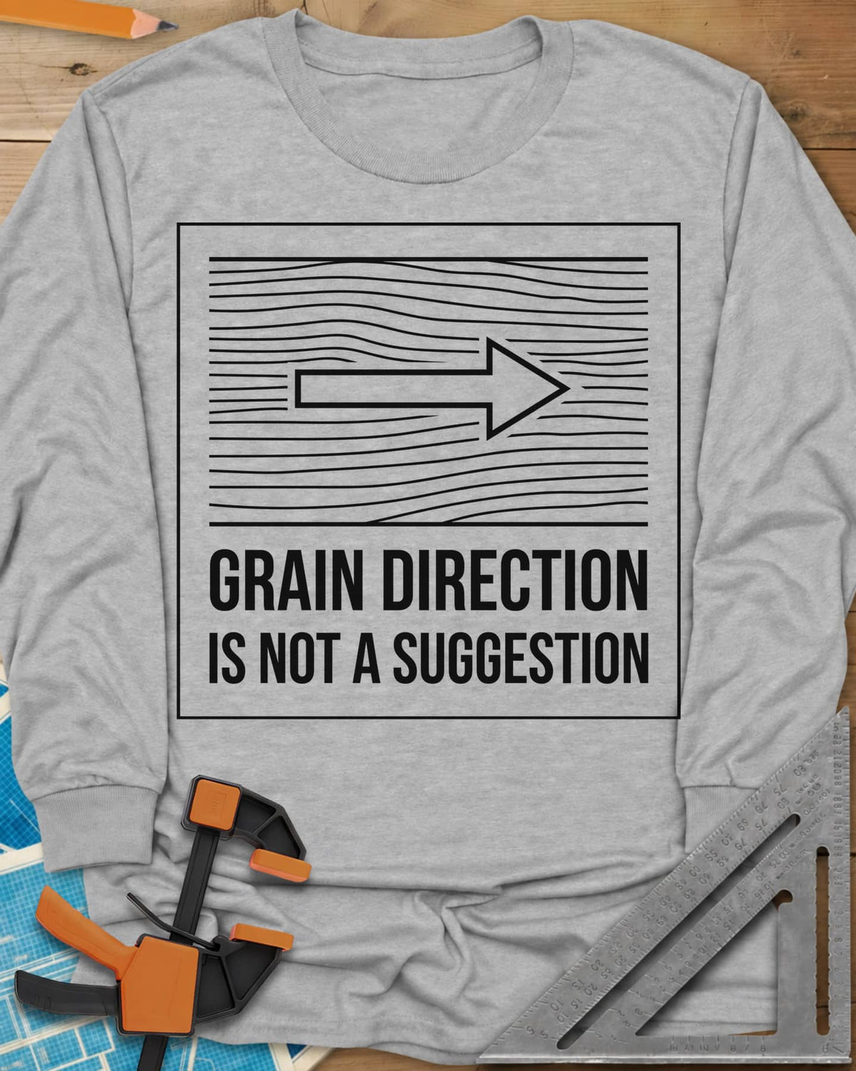 Respect The Grain long sleeve shirt in Sport Grey, boxed wood grain lines with an arrow showing grain direction