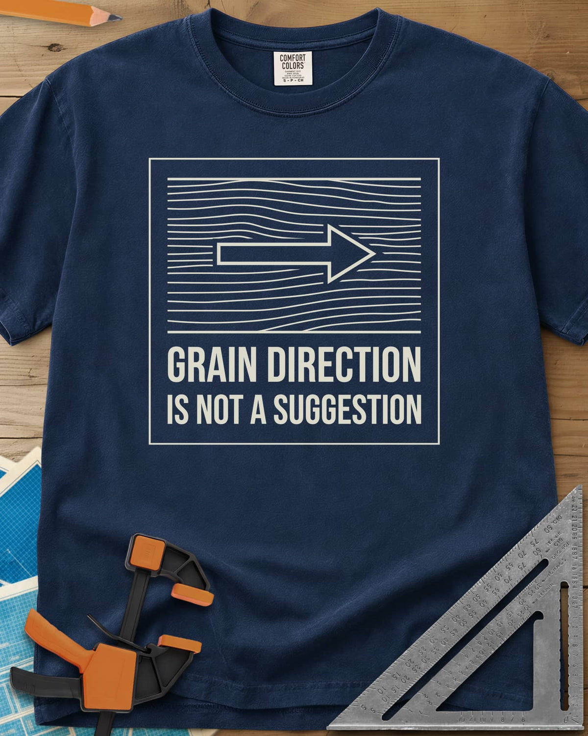 Respect The Grain heavyweight tee in Navy, boxed wood grain lines with an arrow showing grain direction